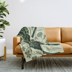 A Cat in the Wildflowers Throw Blanket