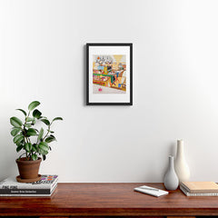 A Cat in the Kitchen Framed Art Print