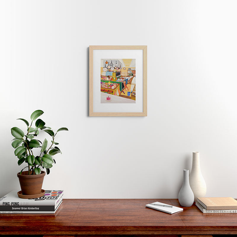 A Cat in the Kitchen Framed Art Print