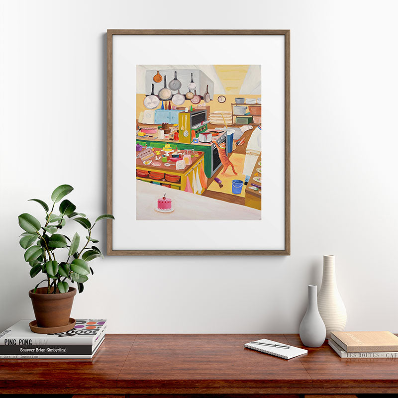 A Cat in the Kitchen Framed Art Print
