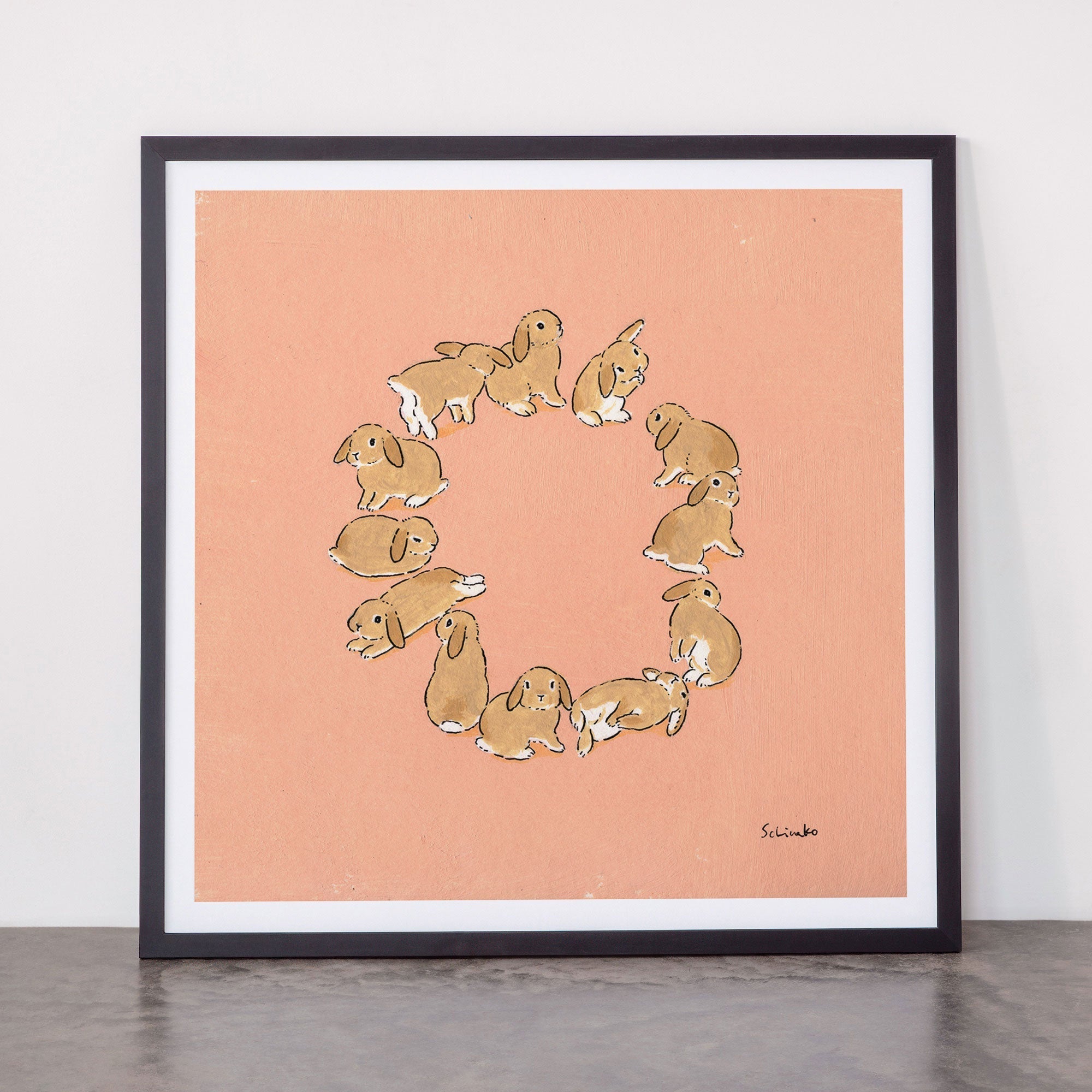 12 lop rabbits Framed Art Print