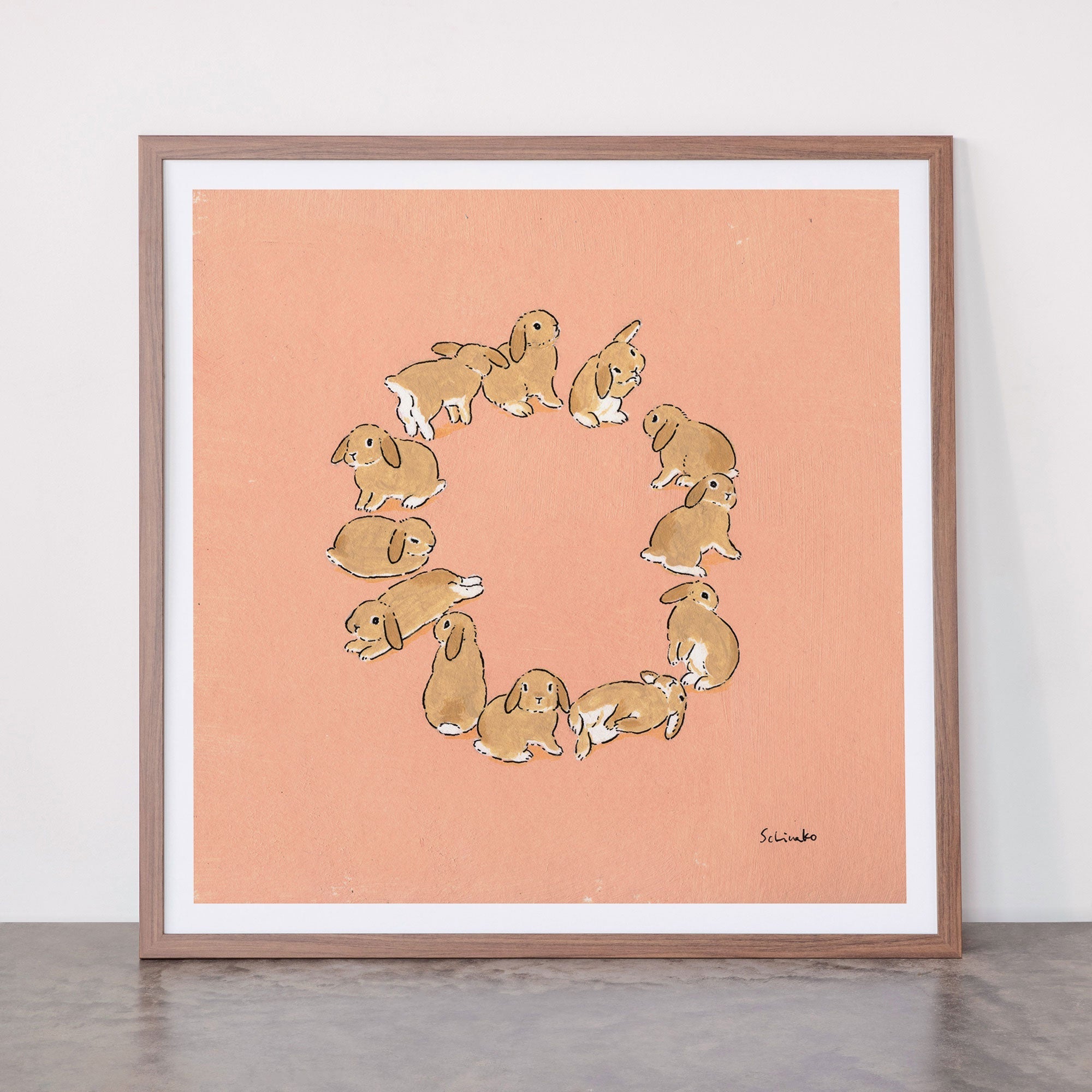 12 lop rabbits Framed Art Print