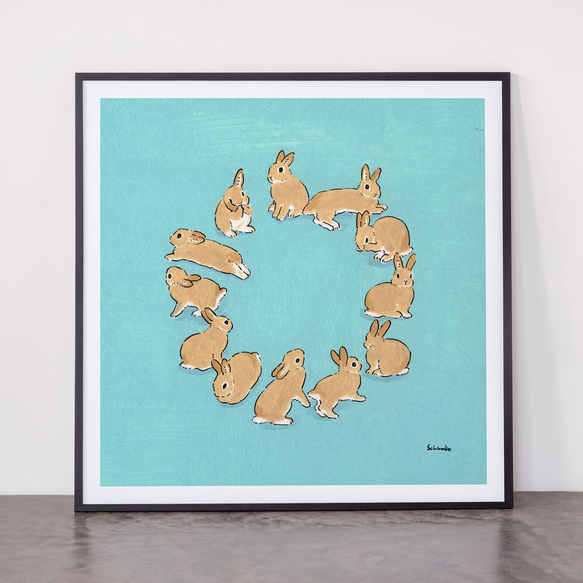 12 rabbits Framed Art Print
