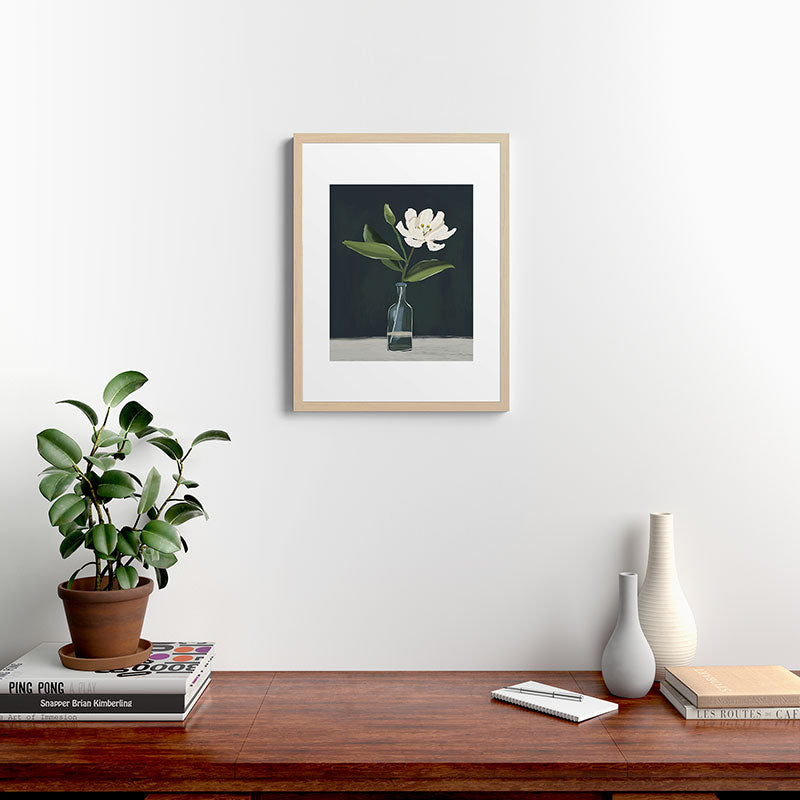 A flower in a vase Framed Art Print