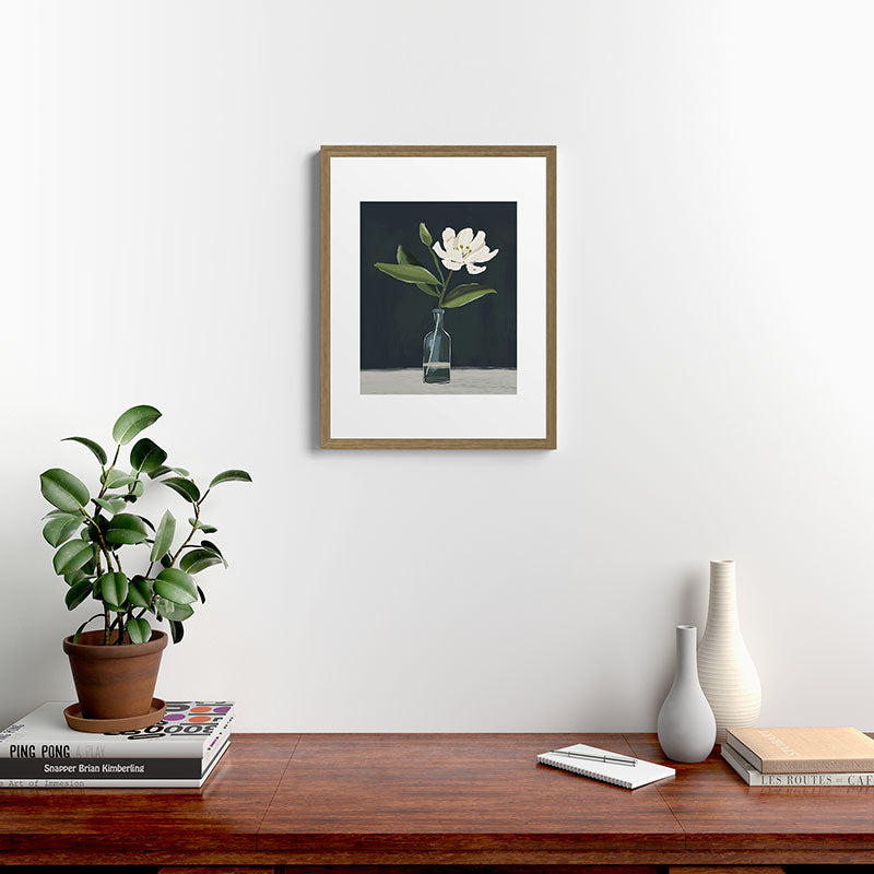 A flower in a vase Framed Art Print