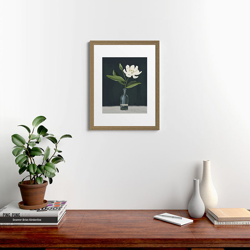 A flower in a vase Framed Art Print